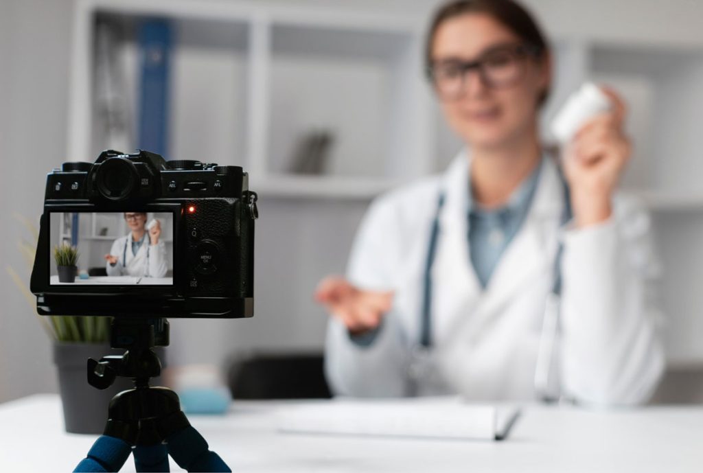Female doctor filming product review for a professional Dentist Explainer Video Production Houston marketing campaign.