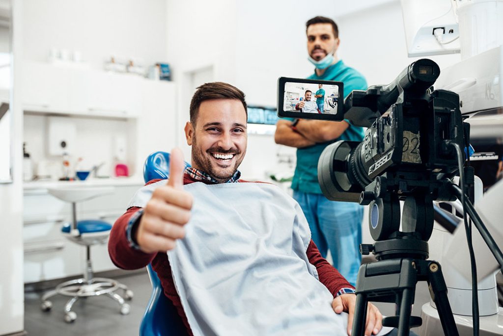 Satisfied patient review being filmed for a highly effective Dental Office Tour Video Houston marketing tool.