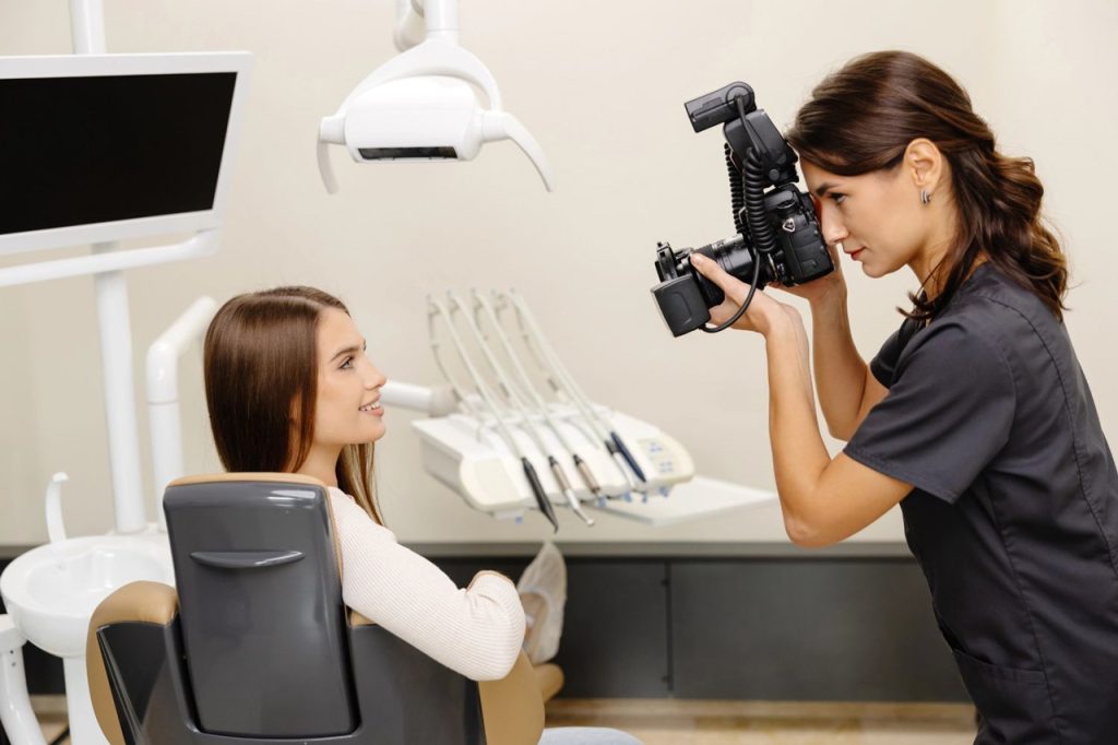 Capturing patient smiles during a shoot with a trusted corporate video production agency Houston for modern dental marketing.