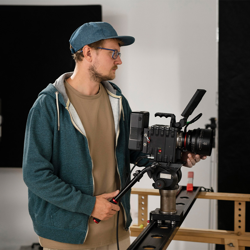 Professional camera on a slider rig filming a studio scene for the best infomercial video production company Houston.