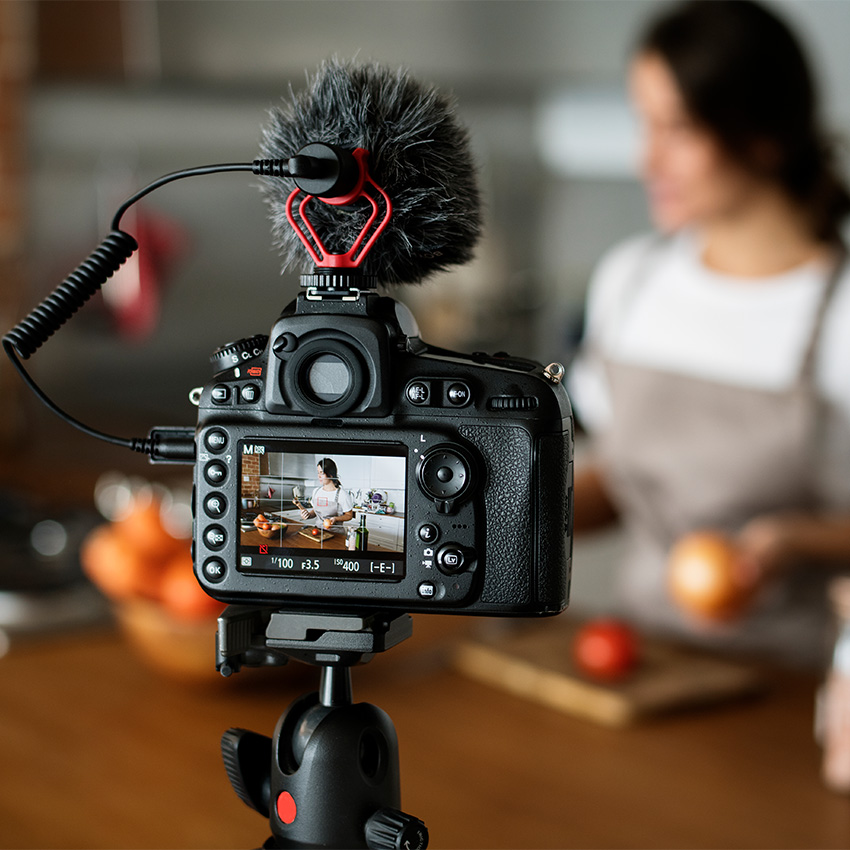 Filming a kitchen product demo with the best infomercial video production company Houston for a cooking commercial.