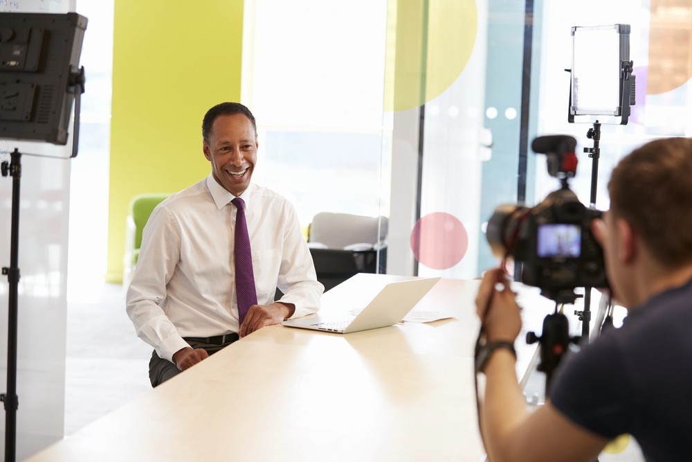 Experienced Houston executive being interviewed and filmed, highlighting professional industrial video production Houston.